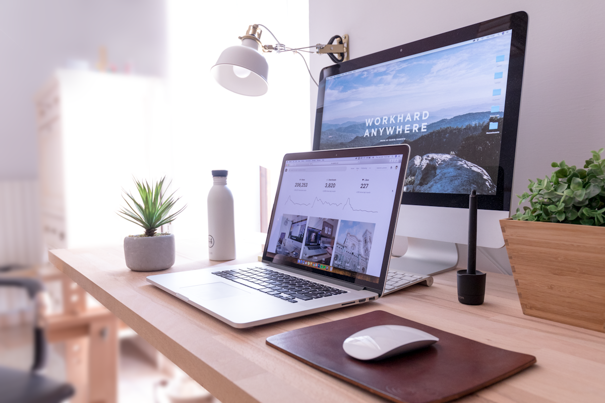 Modern web workspace with analytics on screen