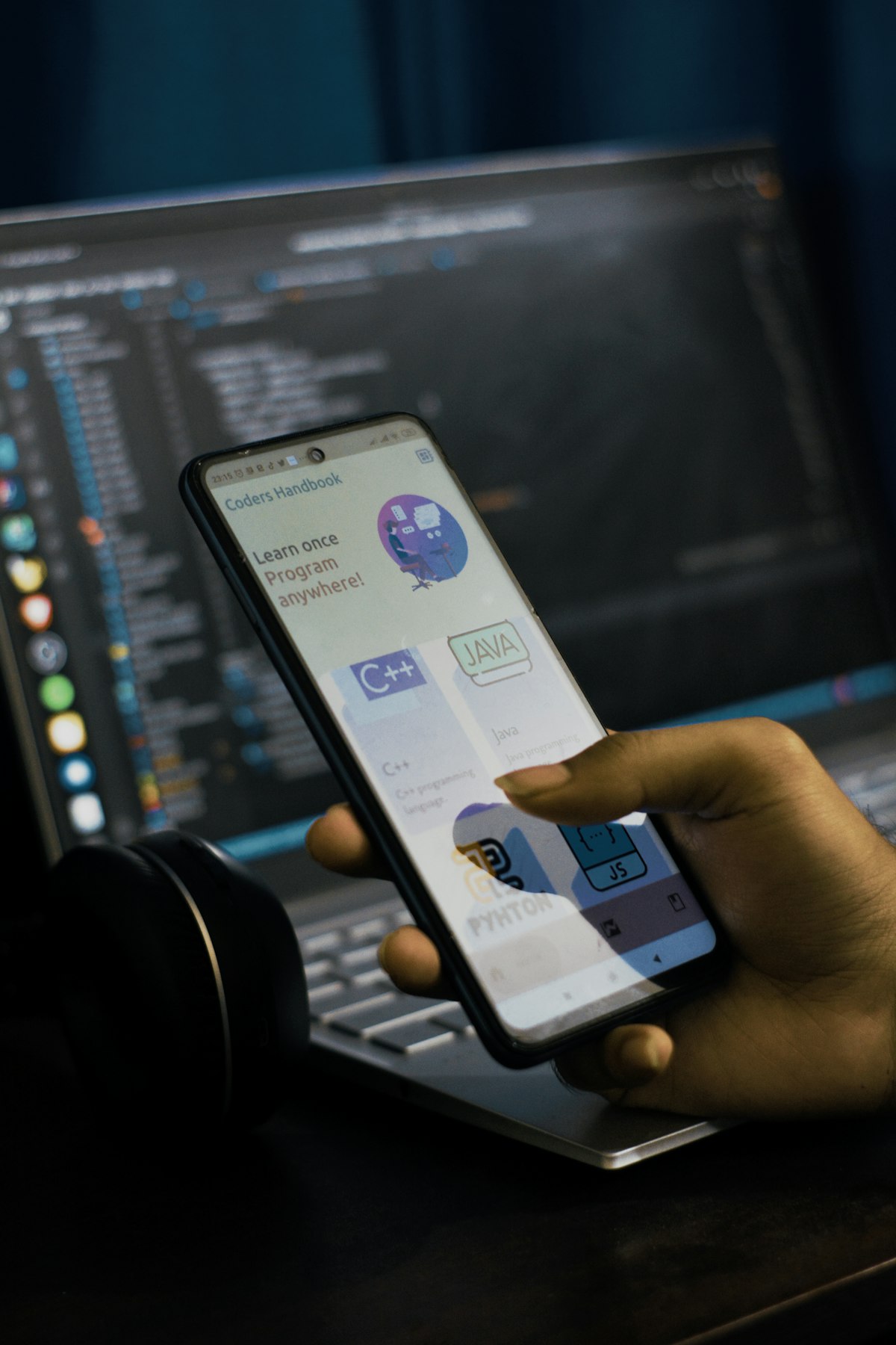 Mobile app and code interface showing automation concept
